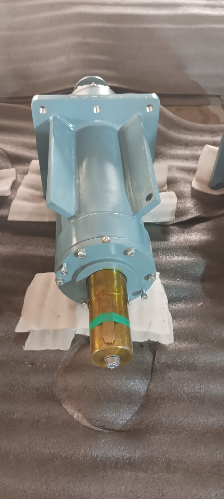 Finished bearing block assembly with brass shaft, painted housing and mounting flange